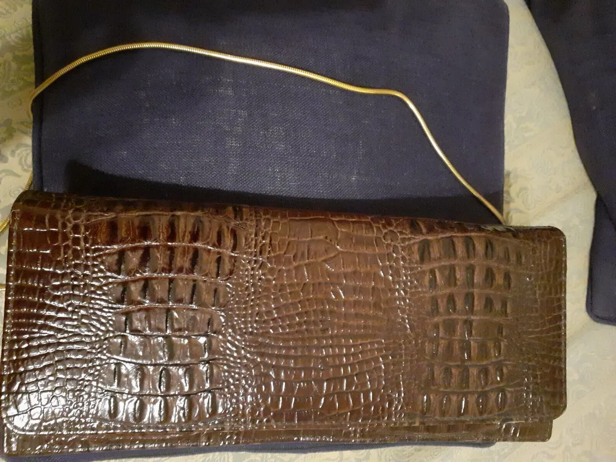 Classic crocodile leather clutch bag with detachable strap