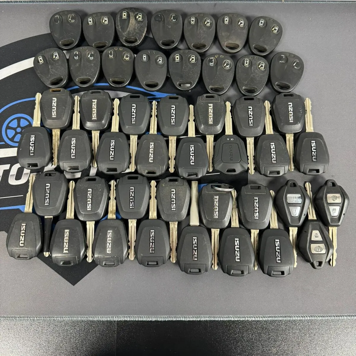 15 X MEGAMOS DELPHI 0-AM / 31 X ISUZU 2 BUTTON KEY FOBS TESTED & WORKING JOBLOT