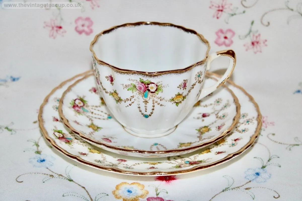 Extremely Rare Hand Painted Staffordshire Bone China Tea Set Trio Bow Cup Plate