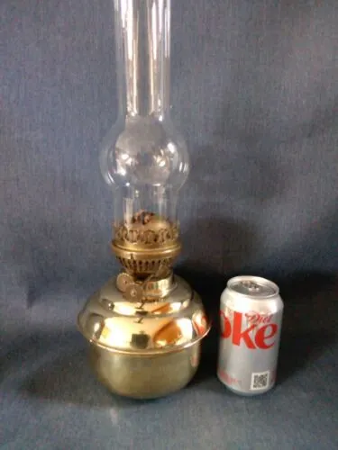 Vintage brass oil lamps used. With Alladin funnel