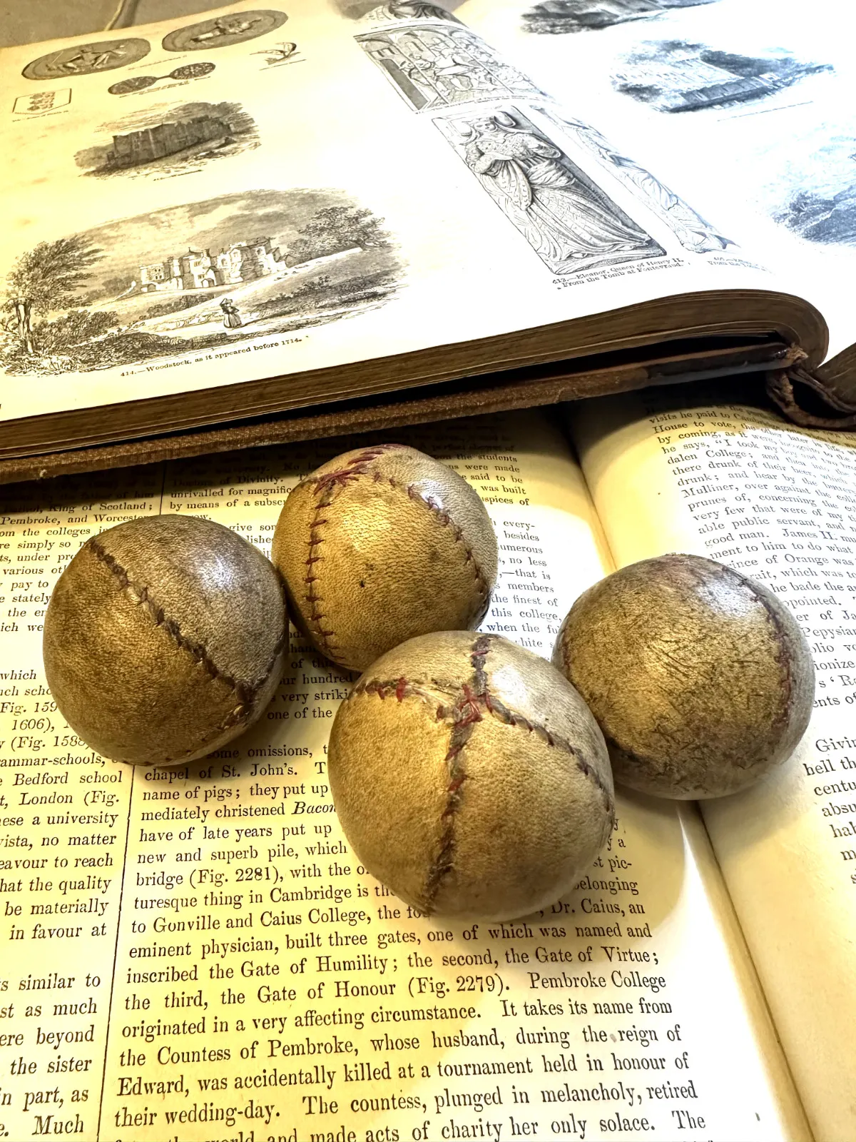 Antique 19th century leather stitched feather stuffed balls.