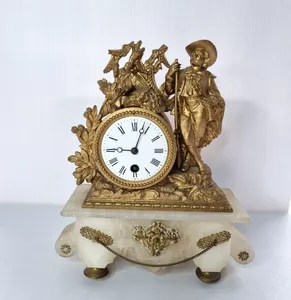 French Mantel Clock Late 19th century French Figural Spelter Gilt Clock