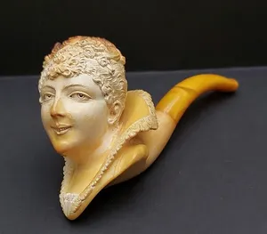 Victorian carved figural Meerschaum and amber estate pipe in a leather case