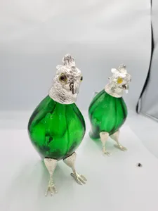 Pair of Silver Plated & Green Glass bird Claret Jugs